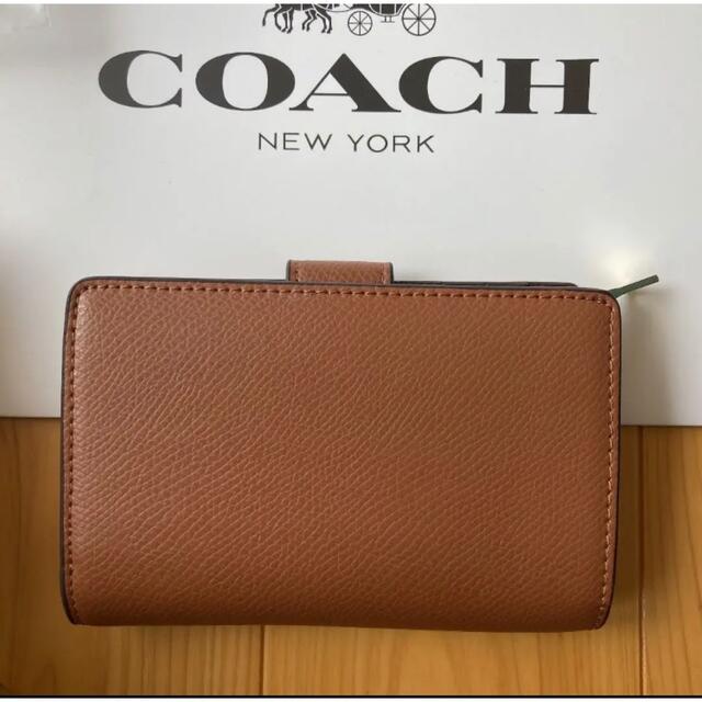 COACH(コーチ)のcoach コーチ　二つ折り財布　シグネチャー　カーキ　サドル　ブラウン　茶色 レディースのファッション小物(財布)の商品写真