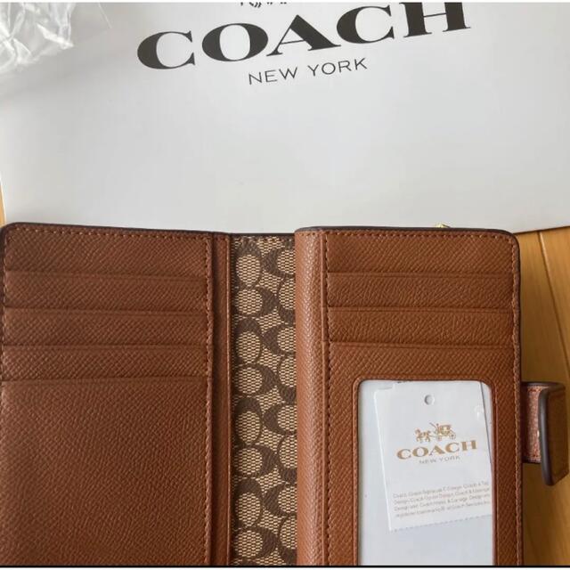 COACH(コーチ)のcoach コーチ　二つ折り財布　シグネチャー　カーキ　サドル　ブラウン　茶色 レディースのファッション小物(財布)の商品写真