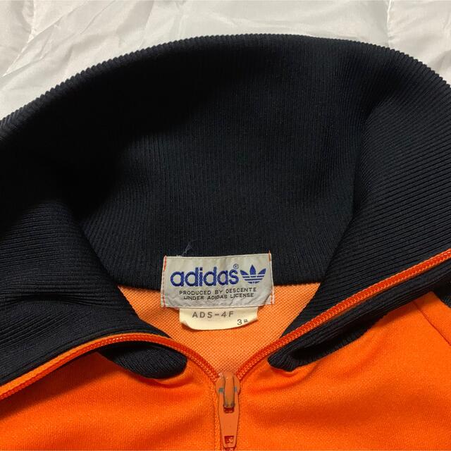 adidas(アディダス)のadidas descente 80s track jacket orange メンズのトップス(ジャージ)の商品写真