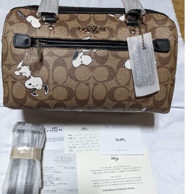 COACH(コーチ)のCOACH  ミニバッグ　シグネチャー　スヌーピー レディースのバッグ(ハンドバッグ)の商品写真