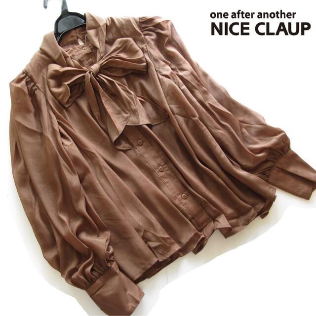 one after another NICE CLAUP(ワンアフターアナザーナイスクラップ)の新品NICE CLAUP リボン付ボリューム袖ブラウス/BR レディースのトップス(シャツ/ブラウス(長袖/七分))の商品写真