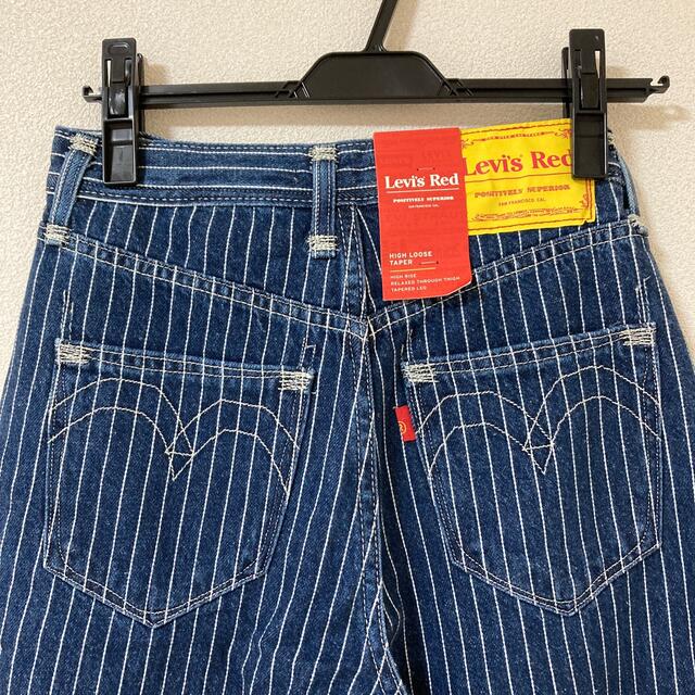 Levi's(リーバイス)の新品　リーバイス　レッド　デニム　25インチ　63cm  ストライプ レディースのパンツ(デニム/ジーンズ)の商品写真