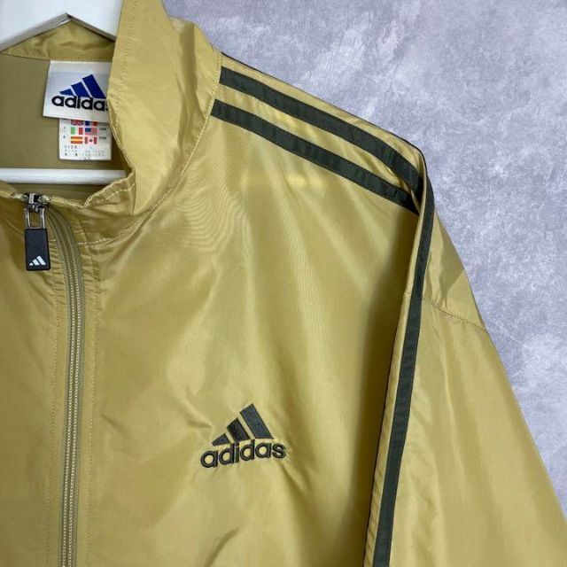 adidas(アディダス)のアディダス 90s ナイロンジャケット トラックジャケット マスタード イエロー メンズのトップス(ジャージ)の商品写真