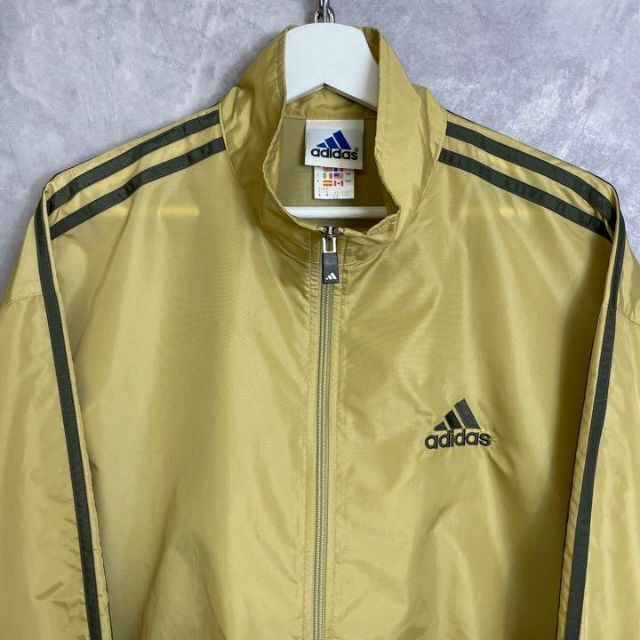 adidas(アディダス)のアディダス 90s ナイロンジャケット トラックジャケット マスタード イエロー メンズのトップス(ジャージ)の商品写真