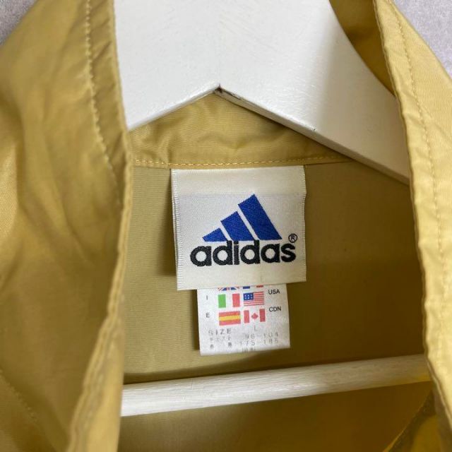 adidas(アディダス)のアディダス 90s ナイロンジャケット トラックジャケット マスタード イエロー メンズのトップス(ジャージ)の商品写真