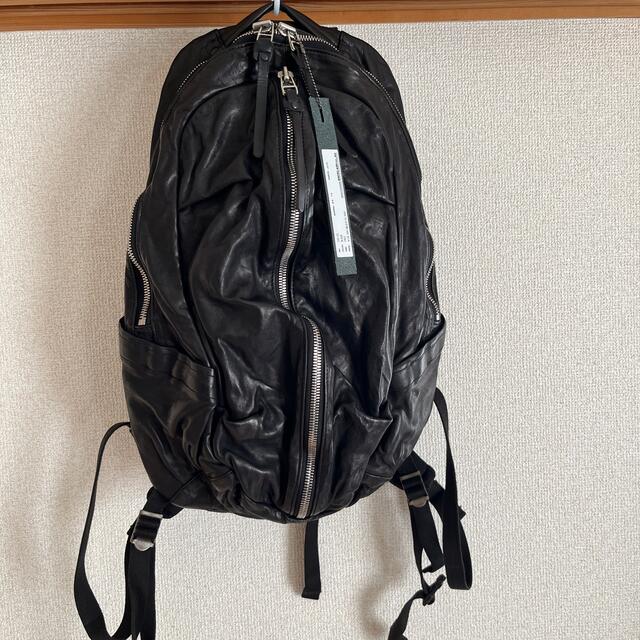 ISAMUKATAYAMA BACKLASH(イサムカタヤマバックラッシュ)のイタリーショルダー製品染め 0.8mm リュック メンズのバッグ(バッグパック/リュック)の商品写真