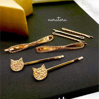 スワロフスキー(SWAROVSKI)のスワロフスキー　猫　リボン　ヘアクリップ　ヘアピン　ヘアアクセサリー(ヘアアクセサリー)