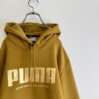 プーマ(PUMA)の古着　プーマ　プルオーバーパーカ　ＸＬ　ゴールドプリント　裏起毛(パーカー)