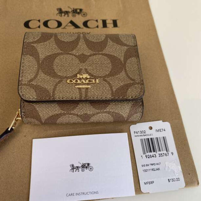 COACH(コーチ)のCOACH コーチ　シグネチャー コンパクト　三つ折り財布 レディースのファッション小物(財布)の商品写真