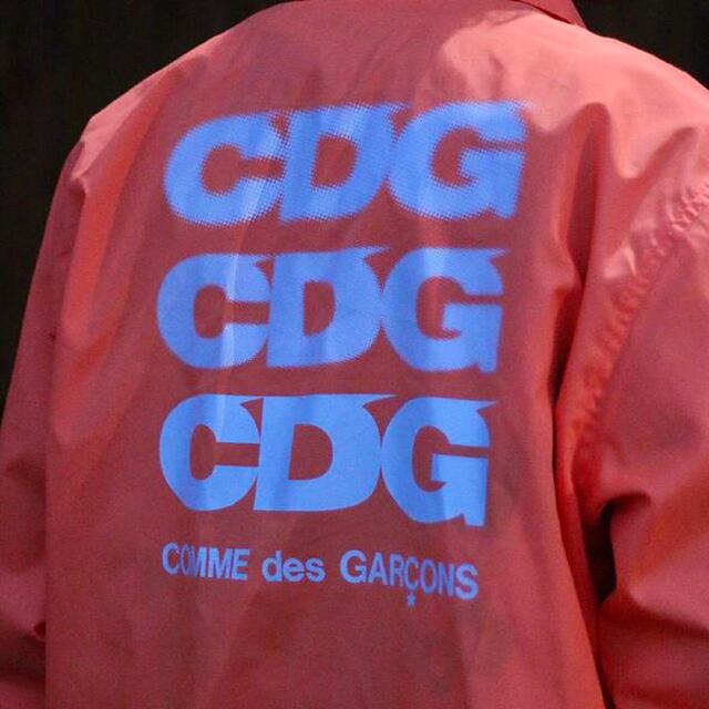 COMME des GARCONS(コムデギャルソン)のコムデギャルソン CDG コーチジャケット 蛍光系 ネオンオレンジ サイズXL メンズのジャケット/アウター(ナイロンジャケット)の商品写真