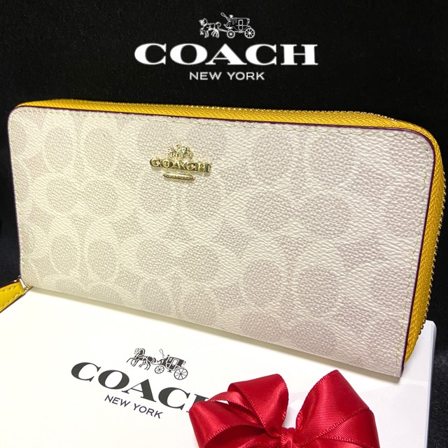 COACH(コーチ)の贈り物にも☆コーチ 財布 ハッピーカラーイエロー×シグネチャーラウンドジップ レディースのファッション小物(財布)の商品写真