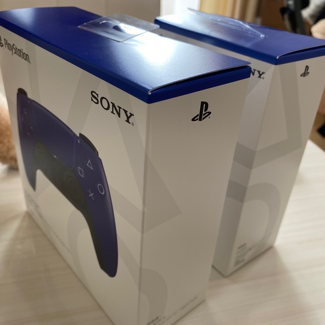 PlayStation(プレイステーション)の新品 PS5 コントローラー DualSense パープル 充電スタンド　セット エンタメ/ホビーのゲームソフト/ゲーム機本体(家庭用ゲーム機本体)の商品写真