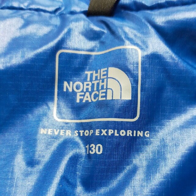 THE NORTH FACE(ザノースフェイス)の未使用　タグなし　ナイロンジャケット　ブルー　130サイズ キッズ/ベビー/マタニティのキッズ服男の子用(90cm~)(ジャケット/上着)の商品写真
