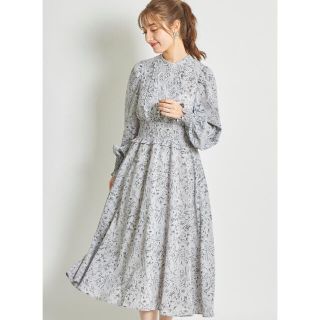 トッコ(tocco)の後ろリボン付きパール釦シャーリング×フリルフラワープリントワンピース♡tocco(ひざ丈ワンピース)