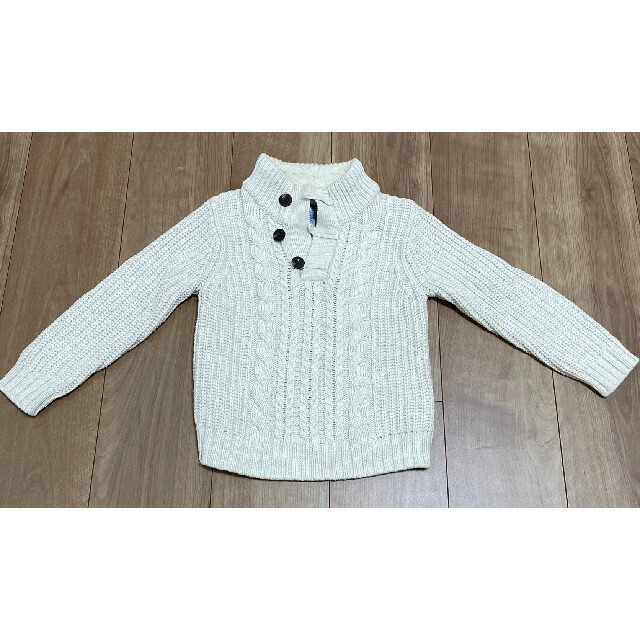 babyGAP(ベビーギャップ)のbabygap 110cm ケーブルニット　オフホワイト キッズ/ベビー/マタニティのキッズ服女の子用(90cm~)(ニット)の商品写真