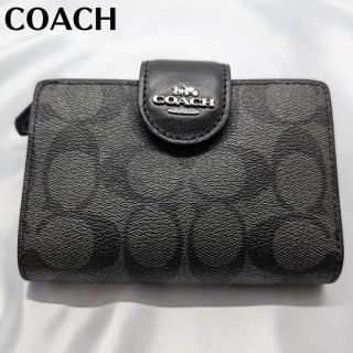 コーチ(COACH)の【新品】コーチ　二つ折財布　シグネチャー　ベルトタイプ　グラファイト　ブラック(財布)