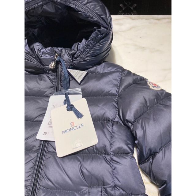 MONCLER(モンクレール)の新年セール！新品、未使用　MONCLER  モンクレールダウン　90〜100 キッズ/ベビー/マタニティのキッズ服女の子用(90cm~)(ジャケット/上着)の商品写真