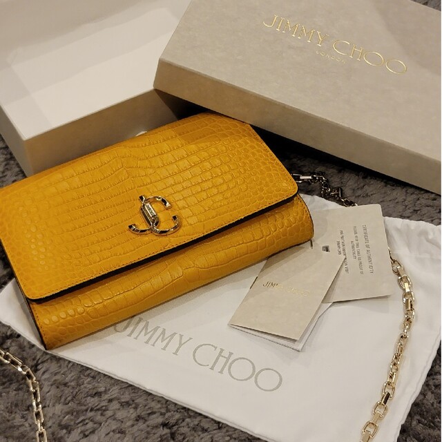 イエローJIMMY CHOO　クラッチバッグ　こっくりイエロー　クロコ調