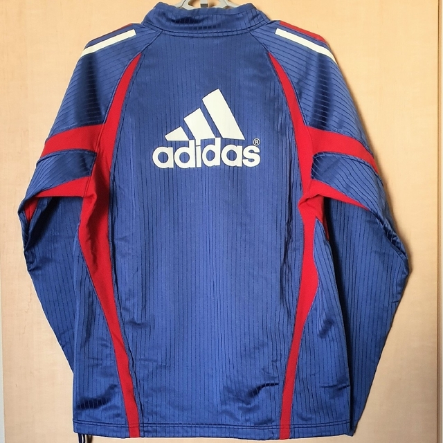 adidas(アディダス)のアディダス サッカー FC東京 ジャージ Ｍ ブルー 両面ビッグ ロゴ used スポーツ/アウトドアのサッカー/フットサル(ウェア)の商品写真