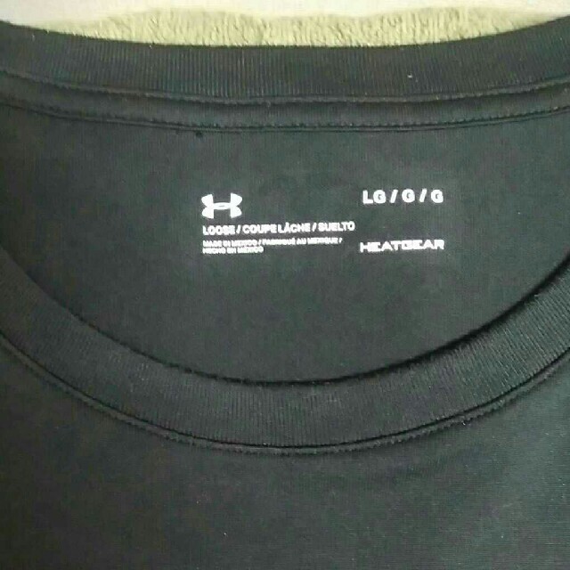 UNDER ARMOUR(アンダーアーマー)のUNDER ARMOUR　半袖Tシャツ ウォームアップ　黒　レディースL-LL レディースのトップス(Tシャツ(半袖/袖なし))の商品写真