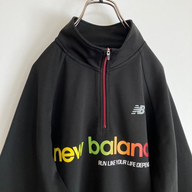 New Balance(ニューバランス)の古着　ニューバランス　ハーフジッププルオーバー　Ｍ　ラグランスリーブ メンズのトップス(その他)の商品写真