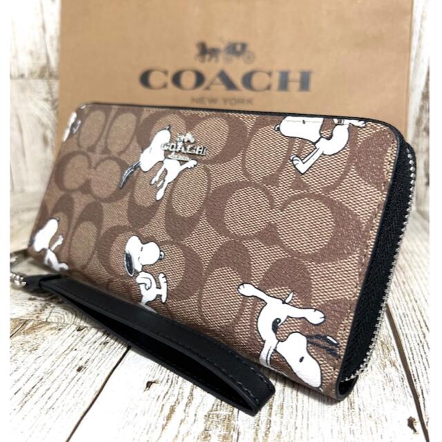 COACH(コーチ)のCOACHスヌーピー コラボ 長財布 ストラップ付き シグネチャー レディースのファッション小物(財布)の商品写真