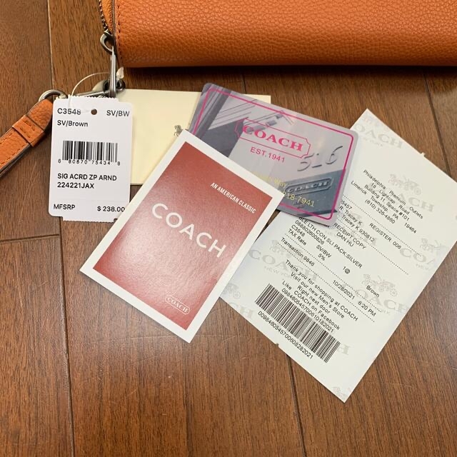 COACH(コーチ)の本体のみ　少し訳あり　3548 コーチ　長財布　オレンジ　コーチ　馬車モチーフ レディースのファッション小物(財布)の商品写真