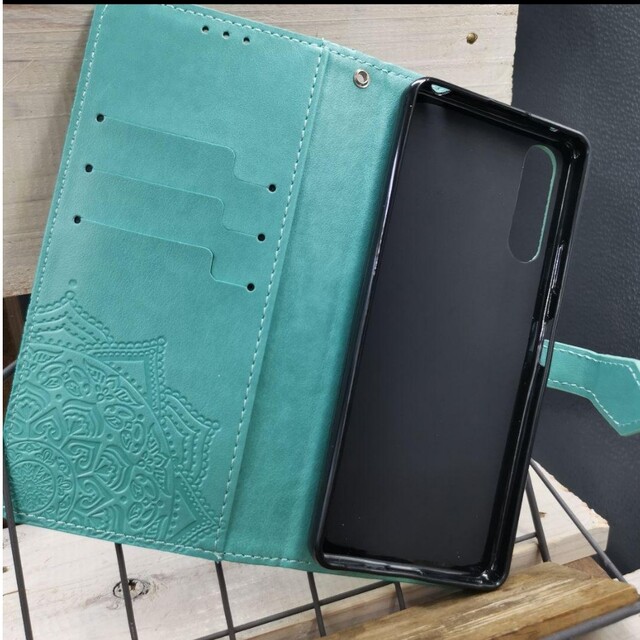 GalaxyA23手帳型エンボスレザー曼荼羅パープルスマホケーススタンド式 通販 ◇GalaxyA23 ◇エンボス曼陀羅 ミントグリーン 手帳型ケース◇ U2