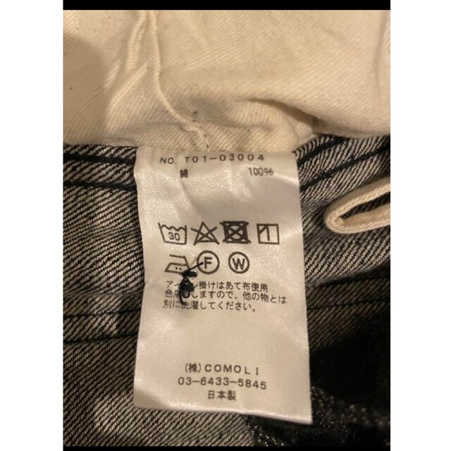 COMOLI(コモリ)のコモリのベルテッドデニム ブラック×エクリュ メンズのパンツ(デニム/ジーンズ)の商品写真
