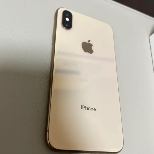 Apple(アップル)のiPhone Xs 64GB ゴールド  (SIMフリー) スマホ/家電/カメラのスマートフォン/携帯電話(スマートフォン本体)の商品写真