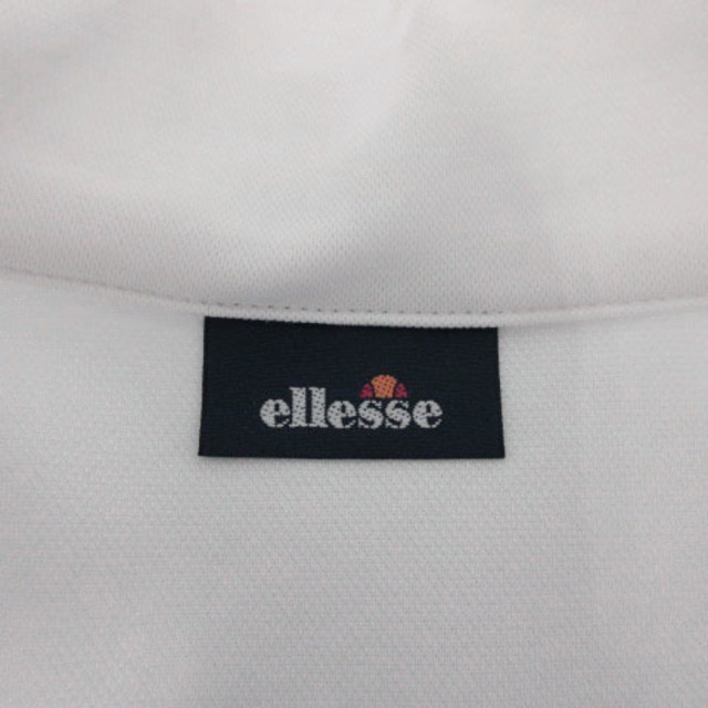 ellesse(エレッセ)のellesse Tシャツ 半袖 ハーフジップ ハイネック ロゴワッペ 白 紺 スポーツ/アウトドアのスポーツ/アウトドア その他(その他)の商品写真