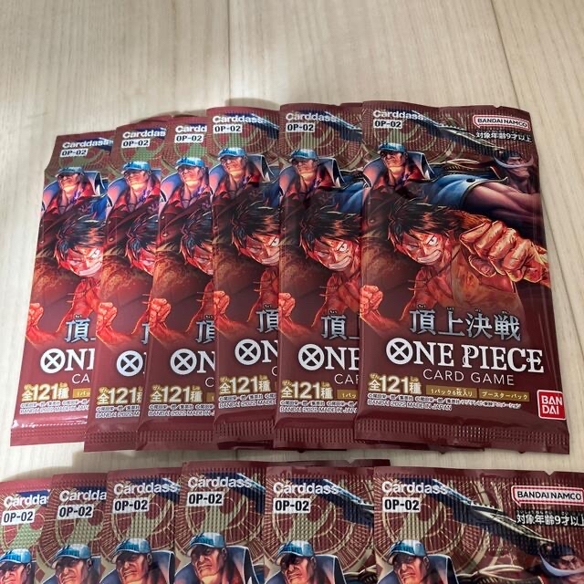 ONE PIECE(ワンピース)のワンピース頂上決戦　12パック＋1　新品未開封 エンタメ/ホビーのトレーディングカード(Box/デッキ/パック)の商品写真