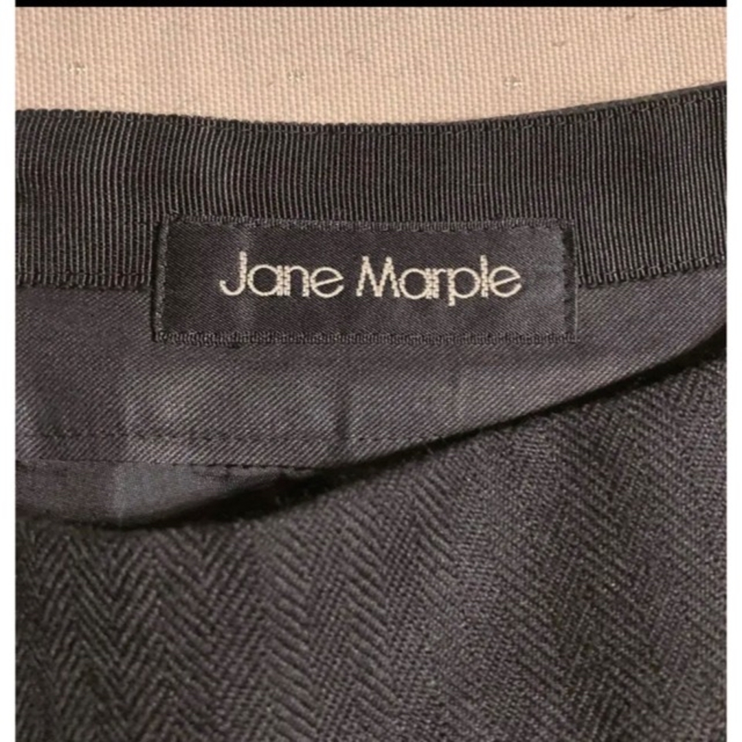 JaneMarple(ジェーンマープル)のジェーンマープル　後ろ下がりデザインのウールヘリンボーンスカート レディースのスカート(ひざ丈スカート)の商品写真