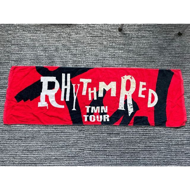 TMN RHYTHM RED TOUR タオル（中古品）【送料無料】 インテリア/住まい/日用品の日用品/生活雑貨/旅行(タオル/バス用品)の商品写真