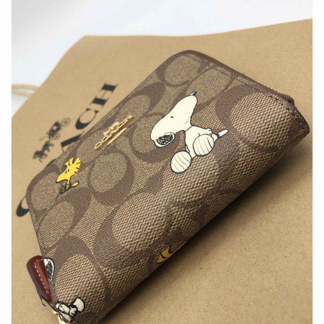 ☆セール30％OFF☆ ☘️新品☘️COACH 折り財布 PEANUTS 猫 ...