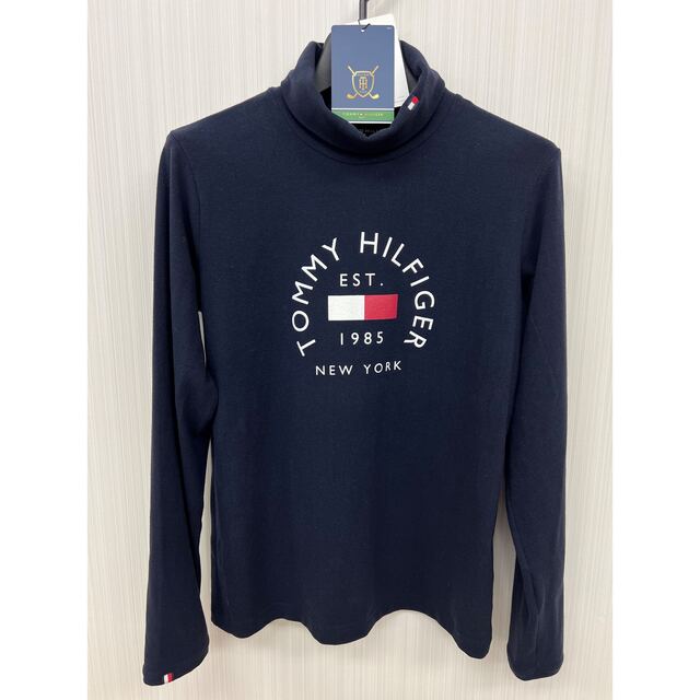 TOMMY HILFIGER(トミーヒルフィガー)の今季モデル！トミーヒルフィガー サークルロゴ ハイネック長袖シャツ　M スポーツ/アウトドアのゴルフ(ウエア)の商品写真