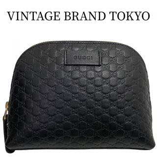底の一部に黒い線あり】グッチ シマレザーポーチ 162torArab
