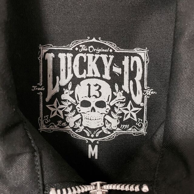 LUCKY13(ラッキーサーティーン)の【美品】激レア lucky13 ラッキー13 前後ロゴ ブラック ブルゾン M メンズのジャケット/アウター(ブルゾン)の商品写真