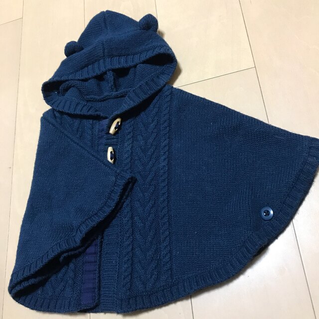 UNITED ARROWS(ユナイテッドアローズ)のニットポンチョ キッズ/ベビー/マタニティのベビー服(~85cm)(ジャケット/コート)の商品写真