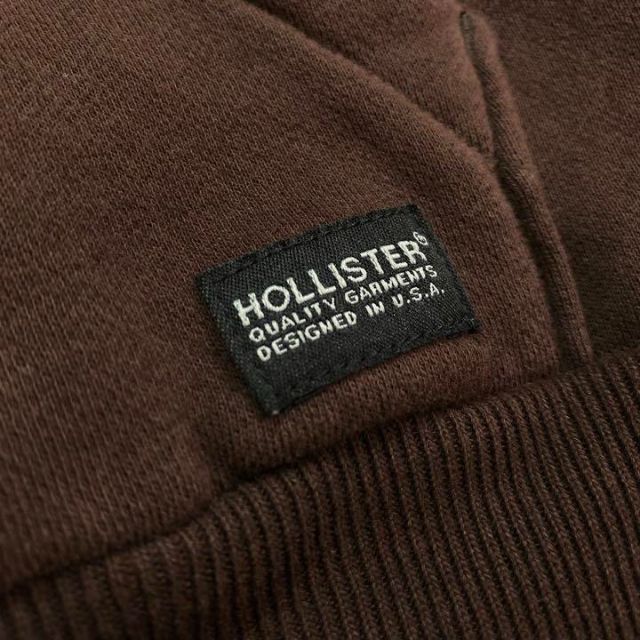 Hollister(ホリスター)の新品【メンズXS】★ホリスター★裾タグ付き無地ワンポイントパーカー/茶色 メンズのトップス(パーカー)の商品写真