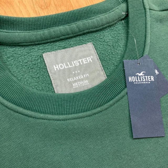 Hollister(ホリスター)の新品【メンズXS】★ホリスター★裾タグ付き無地ワンポイントトレーナー/緑 メンズのトップス(スウェット)の商品写真