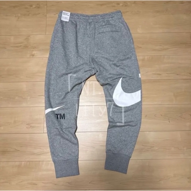 NIKE(ナイキ)のM 新品　NIKE スウッシュ ジョガーパンツ スウェット グレー  ホワイト メンズのパンツ(その他)の商品写真