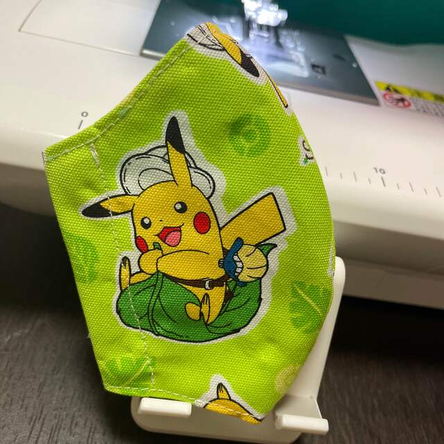 ポケモンココ ピカチュウ 緑地 ハンドメイドのキッズ/ベビー(外出用品)の商品写真