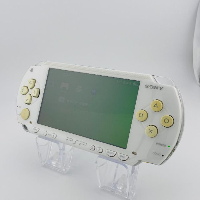 PlayStation Portable(プレイステーションポータブル)のPSP セラミックホワイト PSP-1000CW  + モンスターハンター3rd エンタメ/ホビーのゲームソフト/ゲーム機本体(携帯用ゲーム機本体)の商品写真
