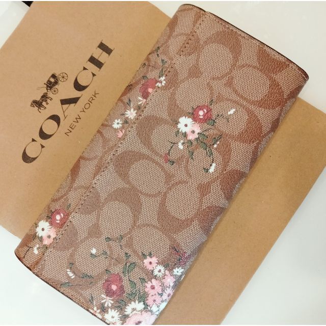 COACH(コーチ)の値下げしました!!【新品未使用】COACH シグネチャー 花柄 長財布 レディースのファッション小物(財布)の商品写真