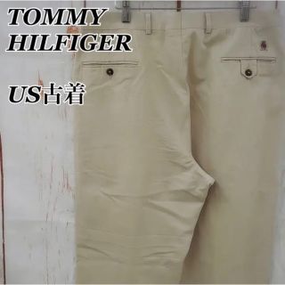 トミーヒルフィガー(TOMMY HILFIGER)の072Z トミーヒルフィガーチノパンツータックワイドテーパードワンポイント刺繍(チノパン)