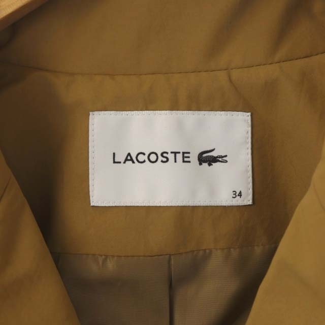 LACOSTE(ラコステ)のラコステ ショートトレンチコート スプリングコート アシンメトリー ベージュ レディースのジャケット/アウター(トレンチコート)の商品写真