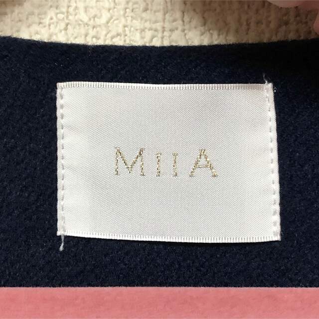 MIIA(ミーア)のミーアMIIA花ビジューシンプルコートS7号紺色超美品 レディースのジャケット/アウター(ロングコート)の商品写真