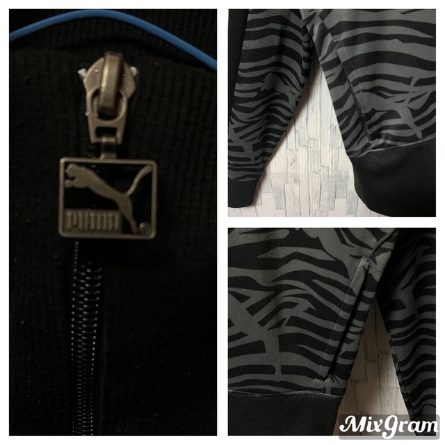 PUMA(プーマ)のプーマ トラックジャケット ハイネック ゼブラ柄 刺繍ロゴ ブラック 黒 レディースのジャケット/アウター(ブルゾン)の商品写真
