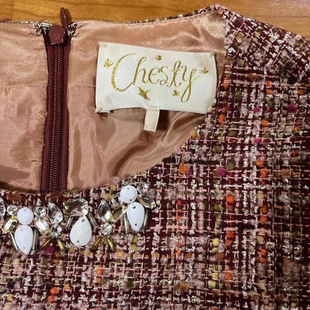 Chesty(チェスティ)のchestyツイードペプラムトップス レディースのトップス(シャツ/ブラウス(半袖/袖なし))の商品写真